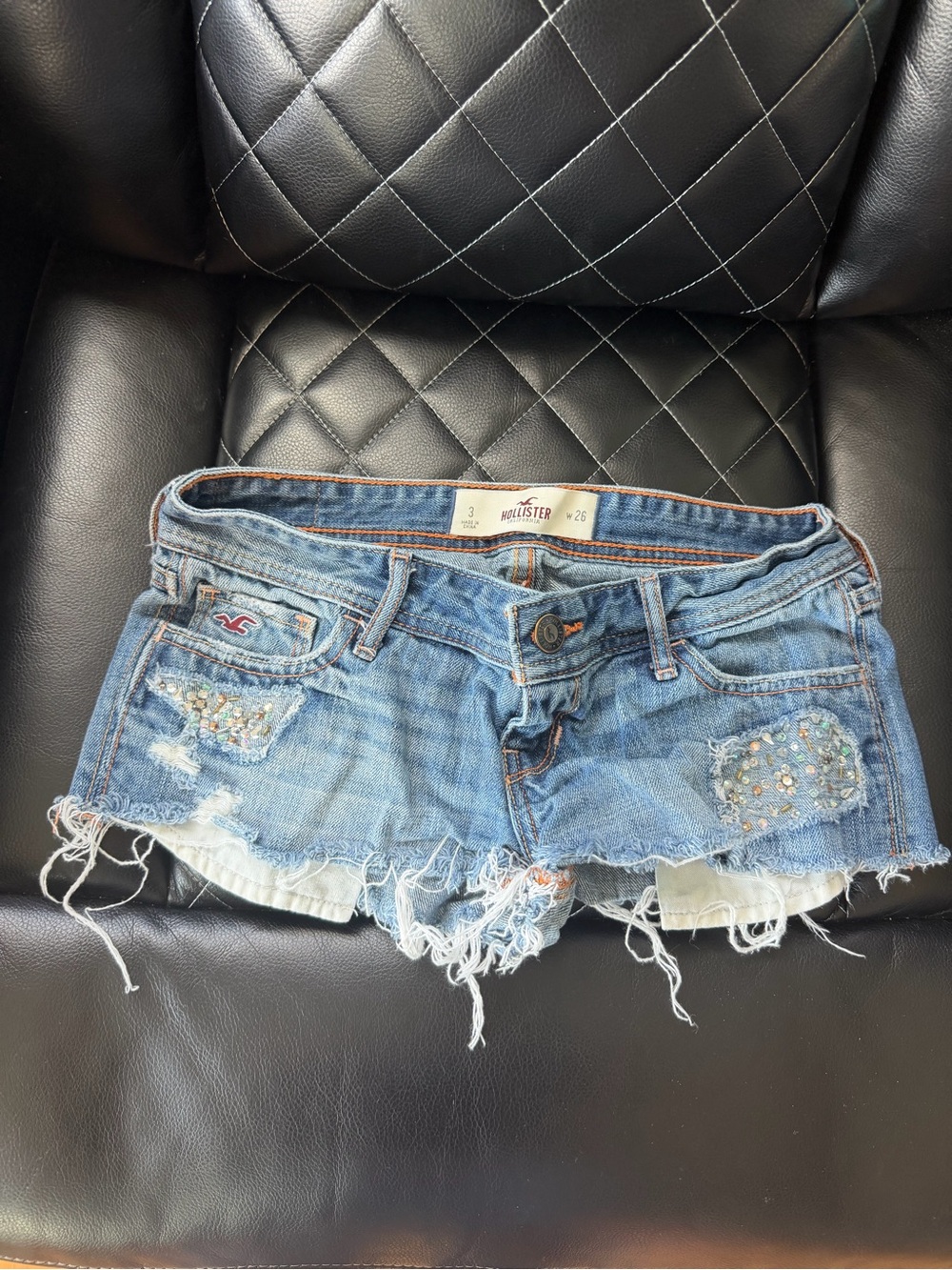Hollister Women's Distressed Denim Cutoff Shorts in Light Blue